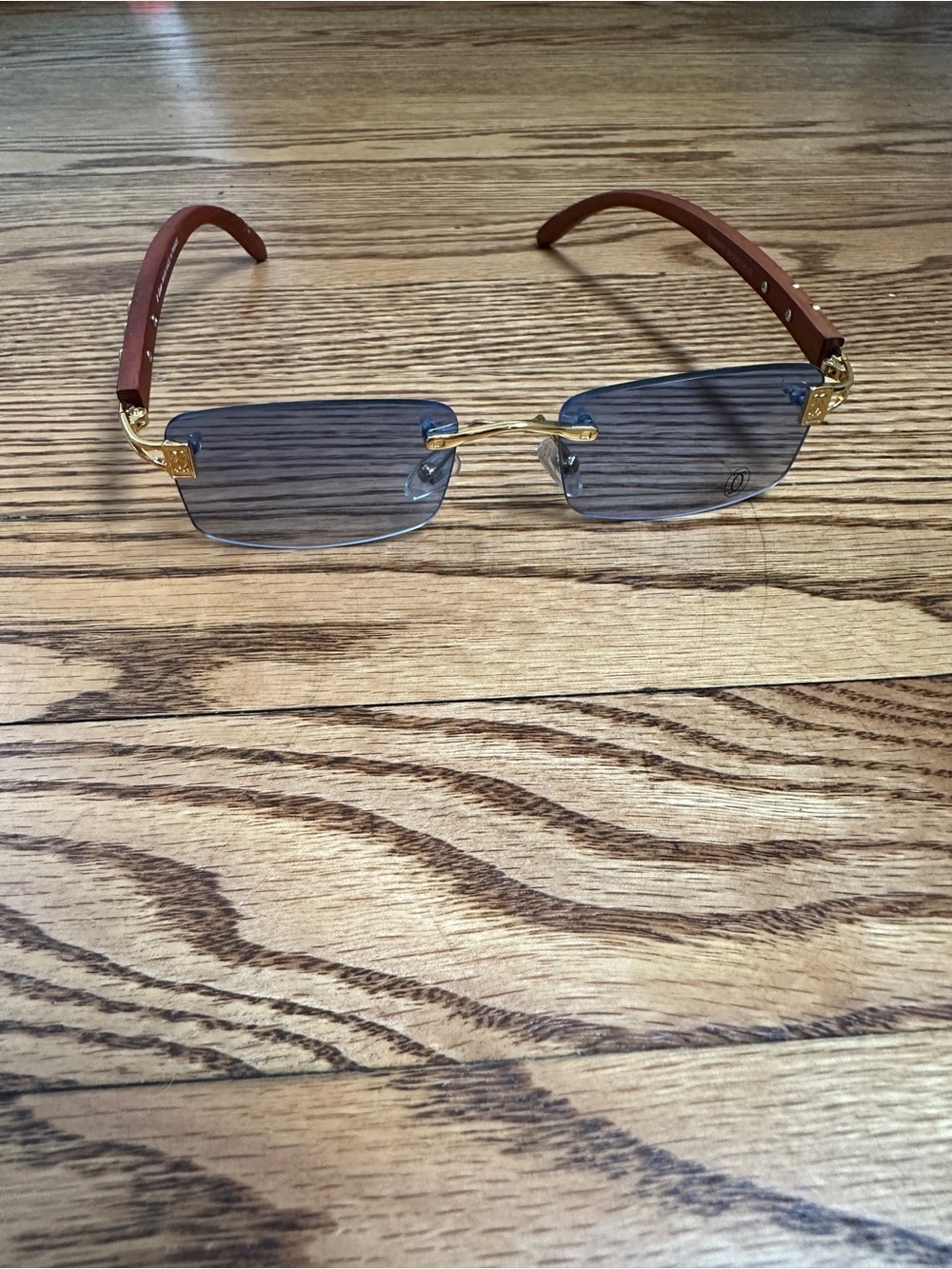 Cartier Rimless Sunglasses with Blue Gradient Lenses and Gold Accents - Picture 3 of 14